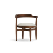 The Naomi wooden chair with a sleek and timeless design, ideal for both dining and workspace settings.